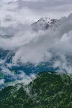 Alps in Clouds Stock Photos