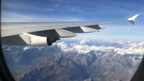 Alps mountain view through airplane window, Switzerland, Europe - 4K Stock Footage 197699282