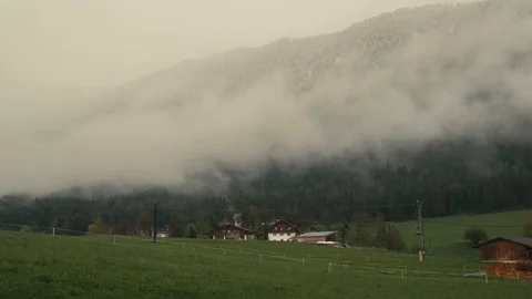 Alps mountains flying clouds timelapse Video stock 74671003