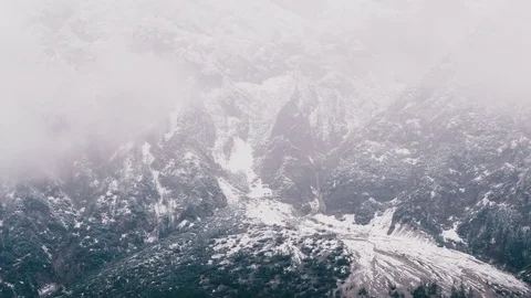 Alps mountains with snow and clouds Video stock 74921037