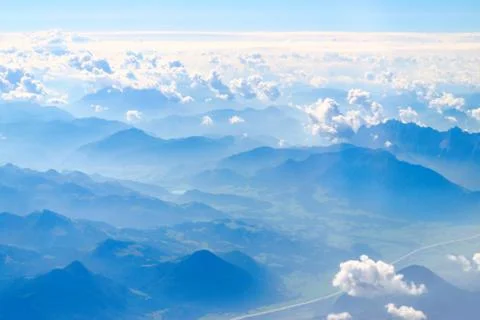 Alps mountains top view from a plain Stock Photos