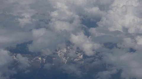 Alps through clouds 00064 1 double speed Video stock 90860293