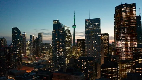 Alt dusk flying left view of Toronto skyline Stock Footage 96322945