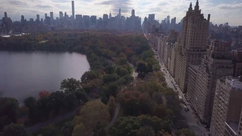 Alt flying north over Central Park facing Central Park West Stock Footage 82104469
