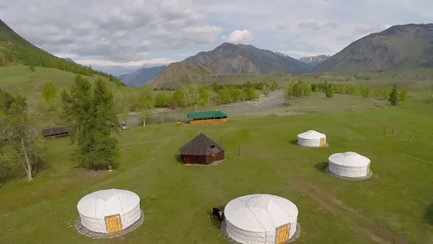 Altai. Flight over nomadic yurt camp in Altay mountains. Top view. Small Stock Footage 71471306