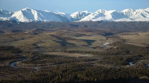 Altai landscape: pine forest hills, snow-capped mountain peaks. River valley. Stock Footage 103107266