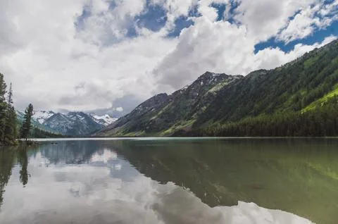 Altai Mountain. second Multi lake overlooking the mountains with snow Stock Photos