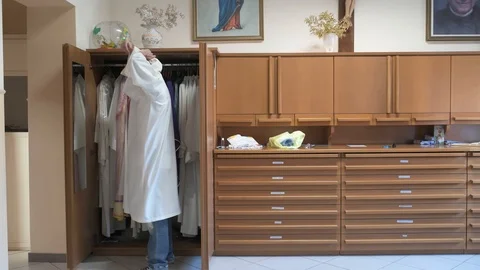 Altar boy and priest Stock Footage 89974455