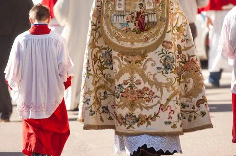 Altar boy and priest Stock Photos