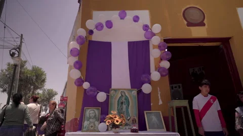 Altar decorated for Señor de los Milagros procession. LIMA, PERU – 2025/11/02 Stock Footage 320373214