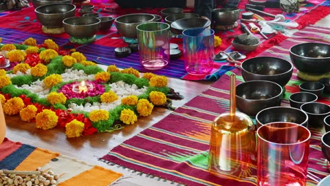 The Altar flowers and candles stays on a wooden floor before a spirit clean.. Stock Footage 341240053