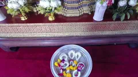 Altar with flowers inside Buddhist Temple Wat Bowonniwet, Bangkok, Thailand Stock Footage 161582862