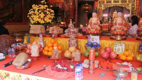 Altar &amp; Offerings in a Buddhist Temple Stock Footage 123349529