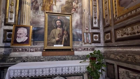 Altar of Saint Jude Thaddeus and Padre Pio in Roman Church Slow Motion Stock Footage 342560150