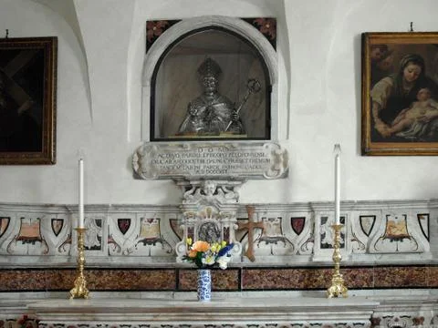 Altar with silver bust of the saint Фото