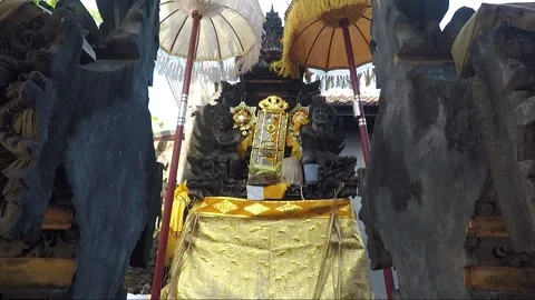 Altar Under Umbrellas inside Temple Courtyard, Kuta, Bali, Indonesia Video stock 304693391