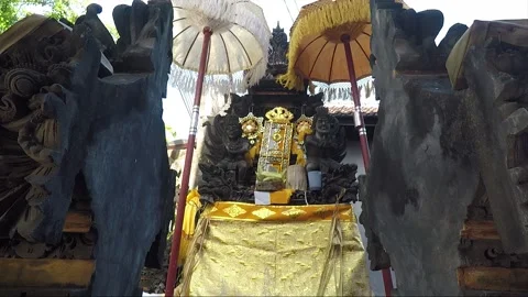 Altar Under Umbrellas inside Temple Courtyard, Kuta, Bali, Indonesia Stock Footage 304693395