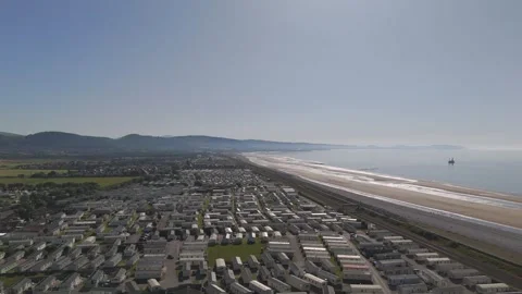 Alternate high aerial view of caravan park near city Stock Footage 313453237