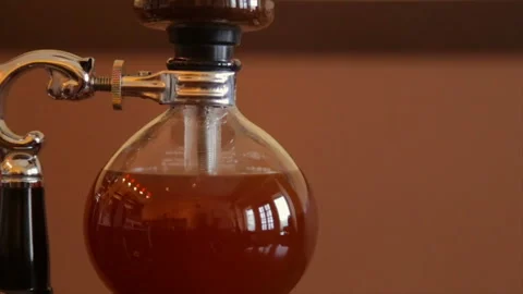 Alternative coffee-making methods. Brewed coffee in a glass flask Stock Footage 85809324