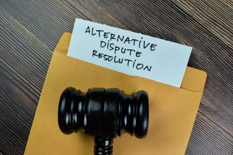 Alternative Dispute Resolution text on document with gavel Stock Photos