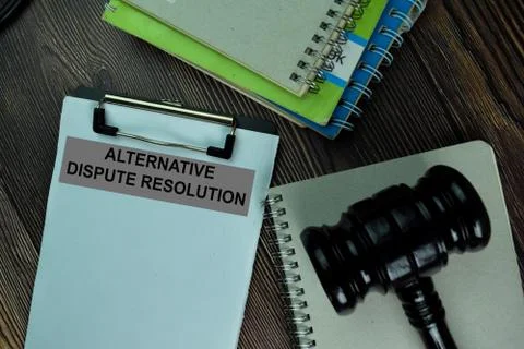 Alternative Dispute Resolution write on a paperwork isolated on wooden table. 스톡 사진