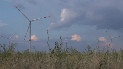 Alternative ecology source renewable wind energy power generator turbines Stock Footage 94535062