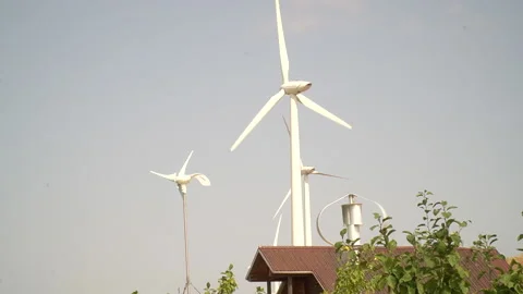 Alternative energy. Large rotating propellers generating wind power Stock Footage 232916635