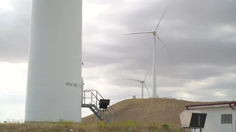 Alternative energy. Large rotating propellers generating wind power Stock Footage 232916813