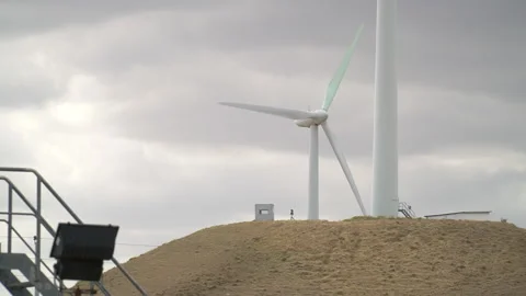 Alternative energy. Large rotating propellers generating wind power Stock Footage 232916829