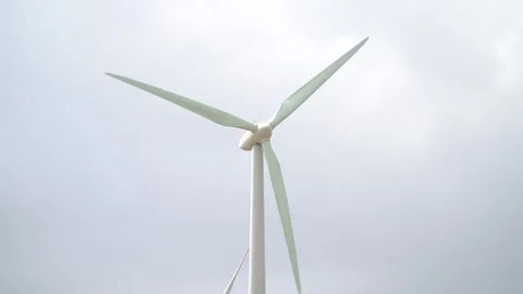 Alternative energy. Large rotating propellers generating wind power Stock Footage 232916930