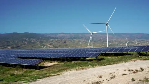 Alternative energy sources with wind and solar panel for green energy production Stock Footage 234712269