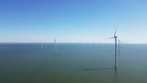 Alternative energy sources, wind turbines produce energy in the North Sea. Stock Footage 335131554