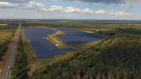 Alternative energy. Vast fields of the large solar power station and highway  Stock Footage 120308080