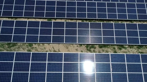 Alternative energy, view of solar panels in field from height Video stock 96310862