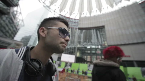 Alternative guy drinking beer Stock Footage 1182247