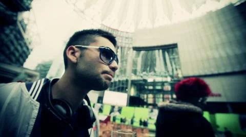 Alternative guy drinking beer Stock Footage 1182273