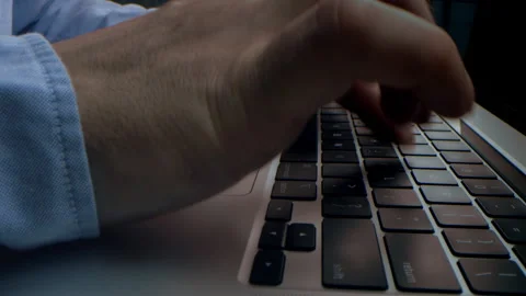 Alternative macro close up of an young businessman hands busy working on laptop Stock Footage 241758905