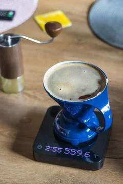 Alternative method of coffee brewing. Dripper on Scales Stock Photos