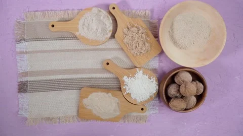 Alternative nut flour. Vegan baking. Almond, walnut, cashew flour. Flat lay Stock Footage 171308883