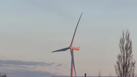 Alternative power generator turning at dawn 4K Stock Footage 330948112