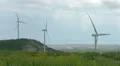 Alternative power sources, green energy generation, wind farm in stormy field 4k or 4k+ Resolution