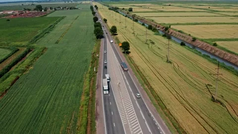 Altitude view of the highway among the fields Video stock 197386746