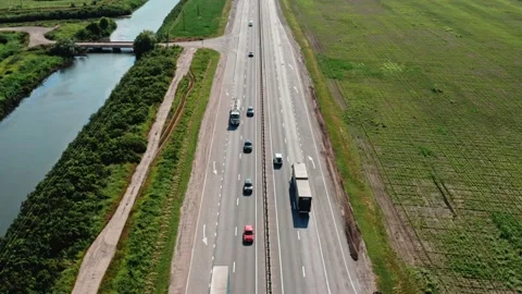 Altitude view of the highway among the fields Stock Footage 197386987