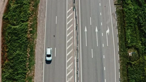 Altitude view of the highway among the fields Stock Footage 197387020