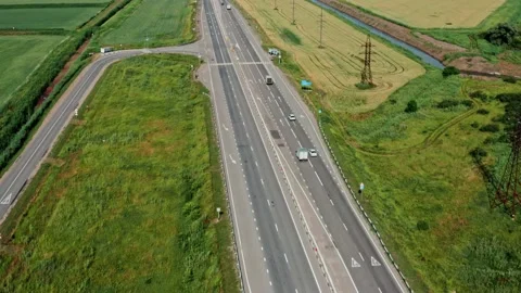 Altitude view of the highway among the fields Stock Footage 197387102