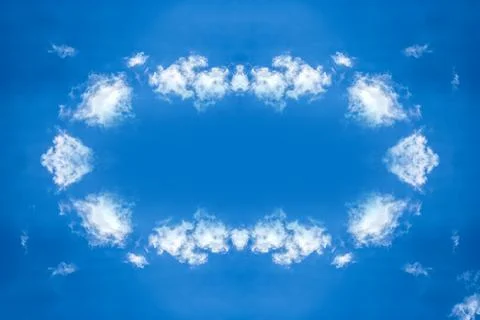 Altocumulus cloud in blue sky. Clouds frame with copy space. Stock Photos