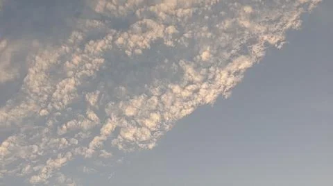 Altocumulus cloud formations in blue sky with sunlight texture Photos