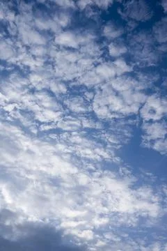 Altocumulus Cloud Patterns in Vibrant Blue Sky Stock Photos