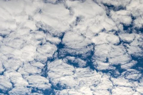 Altocumulus cloud - white clouds in the blue sky Stock Photos