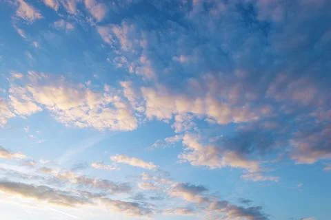 Altocumulus clouds against blue sky Stock Photos